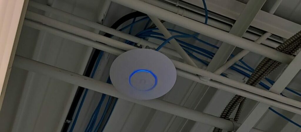 wydraTEK can install and mount wireless Access Points on drop ceilings or in any building type, like in warehouses.